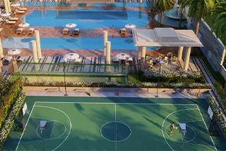 Sports courts alongside the pool deck at Ace Sector 150, Noida